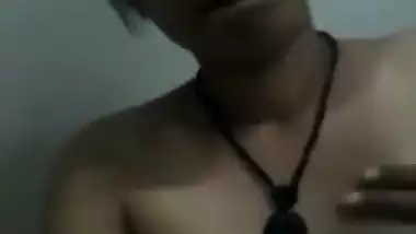 Female shows off her sex titties and rubs XXX clitoris in the corner