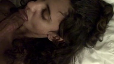 Wavy haired teen giving a blowjob in pov