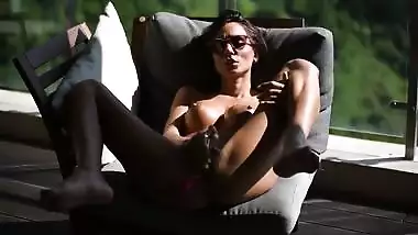 My hot brunette neighbor play with her pussy at balcony